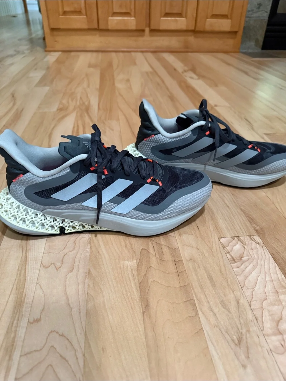 adidas Men's 4DFWD PULSE Grey, Black and White Sneakers with Coral Accents
